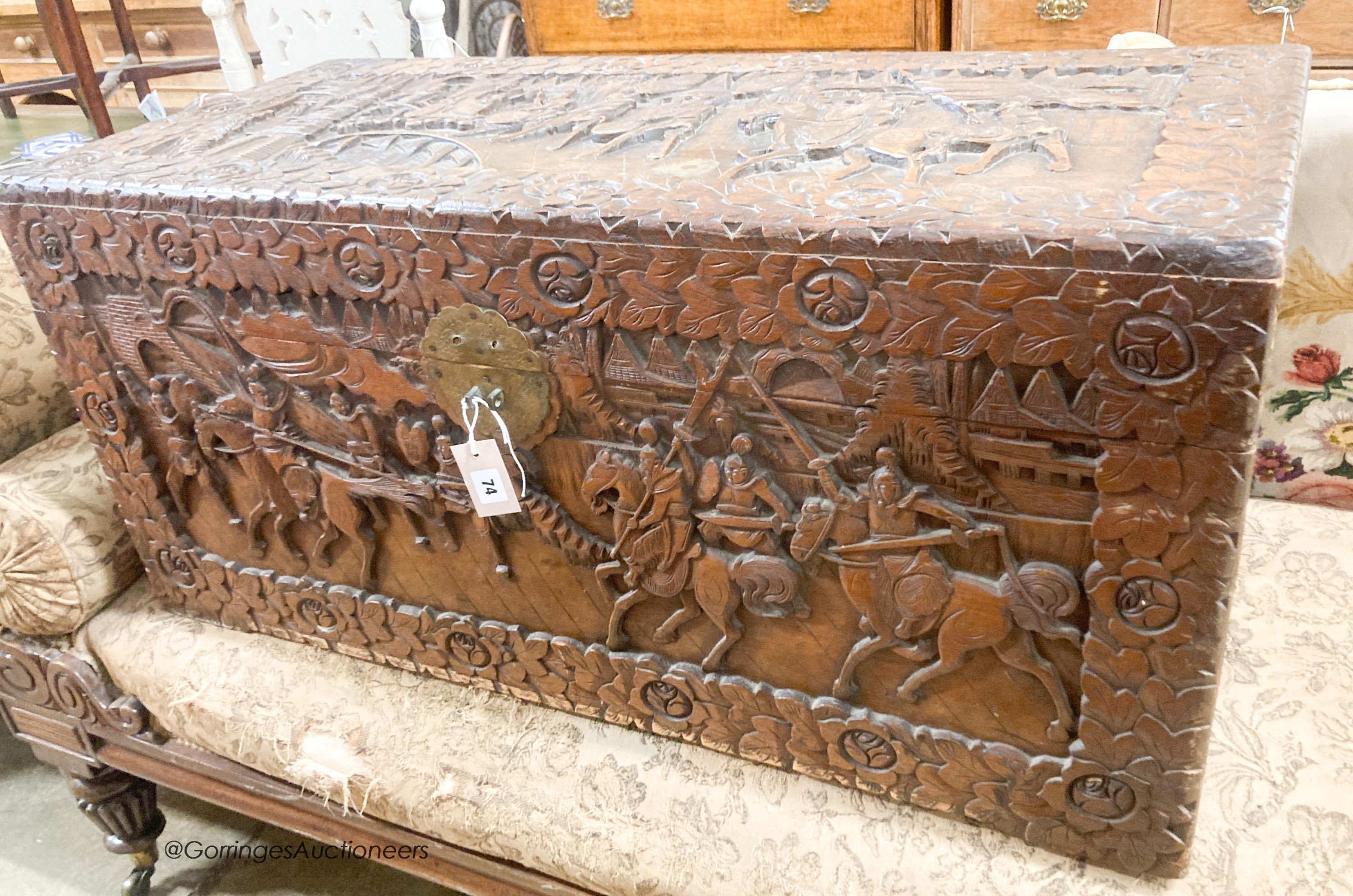 A Cantonese carved hardwood chest, length 104cm, depth 46cm, height 49cm